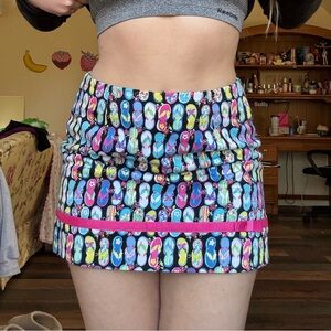 Bamboo Traders Black Mini Skirt with Multicolor Flip-Flop Print and Pink Trim